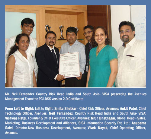 Mr. Neil Fernandez Country Risk Head India and South Asia- VISA presenting the Avenues Management Team the PCI-DSS version 2.0 Certificate