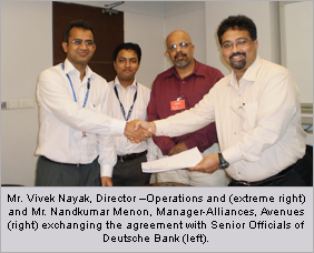 Mr.Vivek Nayak, Director-Operations(extreme right) and Mr.Nandkumar Menon, Manager-Alliances, Avenues(right) exchanging the agreement with Senior Officials Deutsche Bank (left) Mr.Vivek Nayak, Director-Operations(extreme right) and Mr.Nandkumar Menon, Manager-Alliances, Avenues(right) exchanging the agreement with Senior Officials Deutsche Bank (left)