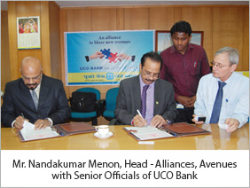 Mr. Nandakumar Menon, Head - Alliances, Avenues with Senior Officials of UCO Bank Mr. Nandakumar Menon, Head - Alliances, Avenues with Senior Officials of UCO Bank