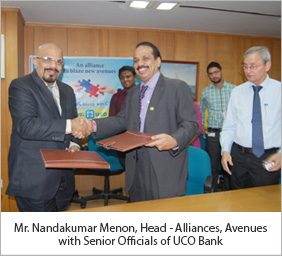 Mr. Nandakumar Menon, Head - Alliances, Avenues with Senior Officials of UCO Bank Mr. Nandakumar Menon, Head - Alliances, Avenues with Senior Officials of UCO Bank